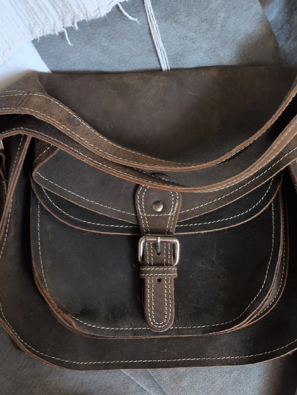 Women’s Brown Leather Messenger Bag with Buckle Detail
